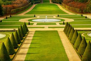 Color landscape photograph of the manicured formal parterre gardens at Chateau de Sceaux in France by William Curtis Rolf. Chateau de Sceaux French Garden Parterre Color Print