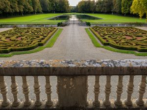 Color landscape photograph of the historic formal water gardens and parterres at Chateau de Courances in France by William Curtis Rolf. Chateau de Courances French Garden Parterre Color Print