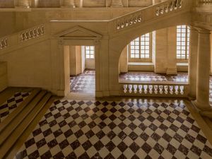Color architectural photograph of Gabriel's Staircase at the Palace of Versailles with burgundy checkered marble floors by William Curtis Rolf. Private access. Palace of Versailles Escalier Gabriel Burgundy Marble Print
