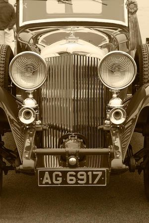 Fine-art sepia tone photograph by William Curtis Rolf capturing a front profile view of the historic 1931 Bentley 8 Litre Vanden Plas Saloon with registration AG 6917 at the Pebble Beach Concours d'Elegance. Pebble Beach Bentley 8 Litre AG 6917 Fine Art Sepia Print