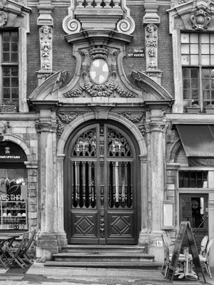 Black and white close up architectural photograph of an ornate historic Flemish Baroque doorway in Lille, France by William Curtis Rolf. Lille France Ornate Doorway Black and White Print William Curtis Rolf