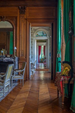 Color architectural photograph of a private 18th-century room enfilade with green drapes at Château de Craon, France, by William Curtis Rolf. Château de Craon Neoclassical Enfilade Fine Art Print