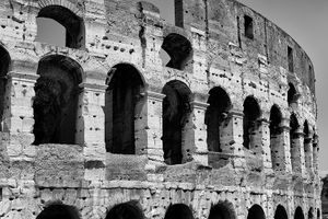 Black and white architectural photograph of the historic Colosseum amphitheater arches and columns in Rome by William Curtis Rolf. Rome Italy Colosseum Architectural Study 1 Black and White Print