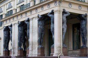 Color photograph of the monumental granite Atlantes statues supporting the portico of the New Hermitage in St. Petersburg by William Curtis Rolf. New Hermitage St Petersburg Atlantes Portico Color Print