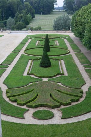 Classical French gardens are designed as outdoor architectural extensions of the château, applying strict geometric order, symmetry, and optical perspective to master nature. Château du Grand-Lucé, France-Architectural Study of Classical French Gardens, 2010 (Color)