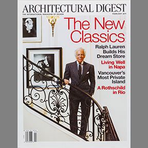 Tear sheet image of the Architectural Digest cover featuring Ralph Lauren standing on the grand staircase of his flagship store in New York City. Architectural Digest Cover The New Classics Ralph Lauren Flagship Manhattan