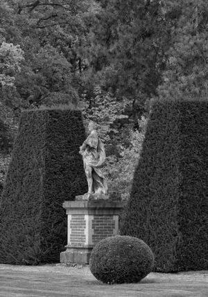 Inquire to acquire official limited edition black and white fine art prints from the Magical Gardens Architectural Study at Château de Sceaux by William Curtis Rolf. William Curtis Rolf black and white photography classical statue sculptured yew boxwood Chateau de Sceaux France Formal Gardens Portfolio