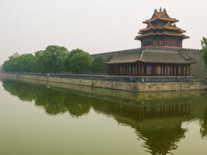 2013 color architectural photograph of the iconic Corner Tower reflected across the water moat at the Forbidden City in Beijing by William Curtis Rolf. Forbidden City Corner Tower Moat Color Fine Art Print