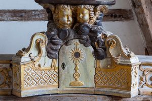 Color close up photograph of an antique carved wooden tabernacle inside a rural country church in France by William Curtis Rolf. French Country Church Tabernacle Wood Carving Color Print