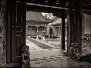 2013 black and white architectural photograph of the traditional formal entrance gate at Prince Gong's Mansion in Beijing by William Curtis Rolf. Prince Gongs Mansion Beijing Entrance Black White Print