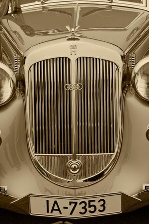 Fine-art sepia tone vertical photograph by William Curtis Rolf isolating the front chrome grille and crowned emblem of the 1937 Horch 853 Sport Cabriolet at Pebble Beach. Pebble Beach 1937 Horch 853 Best of Show Sepia Print