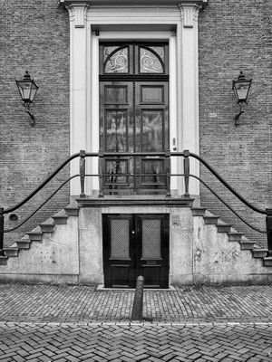 Black and white architectural photograph of historic 17th-century gabled canal houses in Amsterdam by William Curtis Rolf. Amsterdam Canal Houses Architectural Study 1 Black and White Print