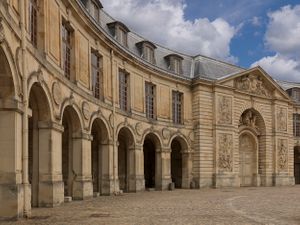 Inquire to acquire official limited edition color fine art prints of the Versailles Royal Stables entrance by William Curtis Rolf, from the monograph Les Ecuries des châteaux français (The Stables of French Castles). William Curtis Rolf color photography Royal Stables entrance gateway architecture study Chateau de Versailles France Equestrian Traditions Portfolio