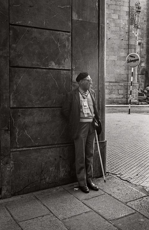 Man in town with cigarette Caceres, Spain 1974