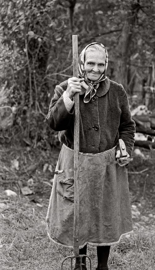 Woman with pitchfork near  Asilo, Spain 1974