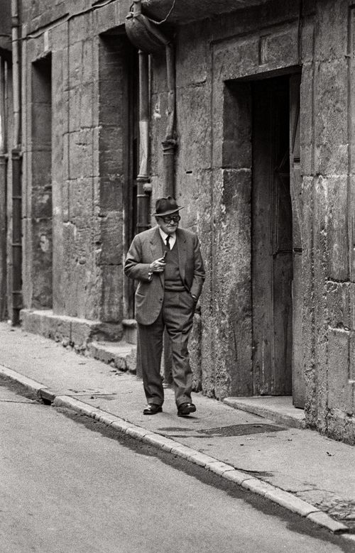 Man walking down the street in Santiago, Spain 1974. Photographer Nancy LeVine