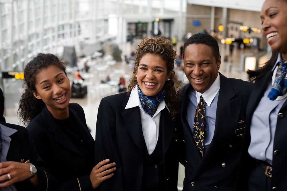 Group portrait of african american flight attendants for alaska airlines