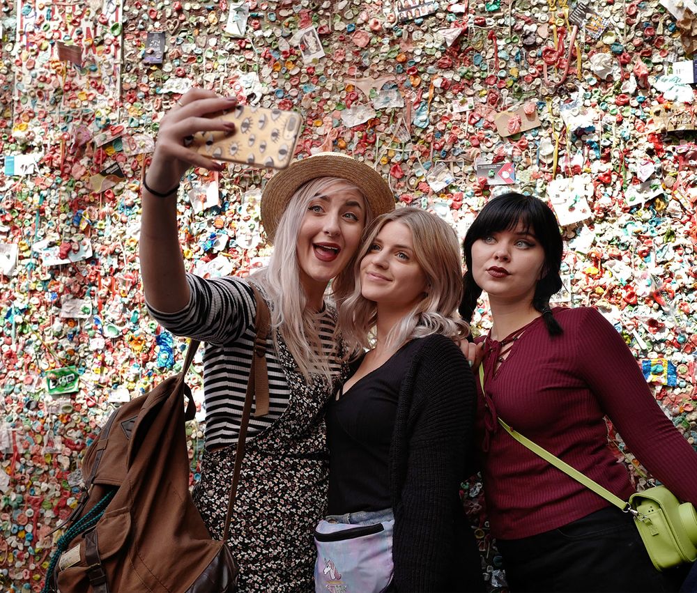Pike Place Market, Seattle, Washington Selfie girls at the gum wall, Seattle