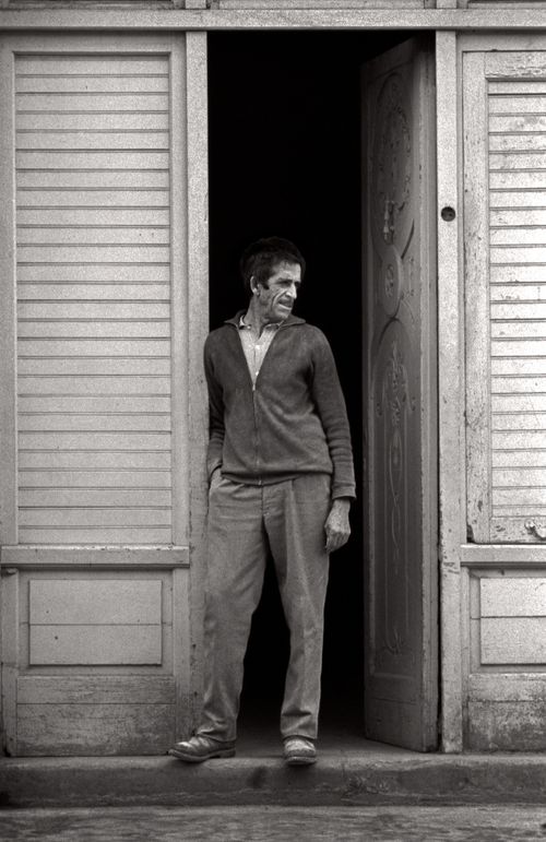 Man in doorway in Santiago Plaza, Spain 1974. Photo by Nancy LeVine