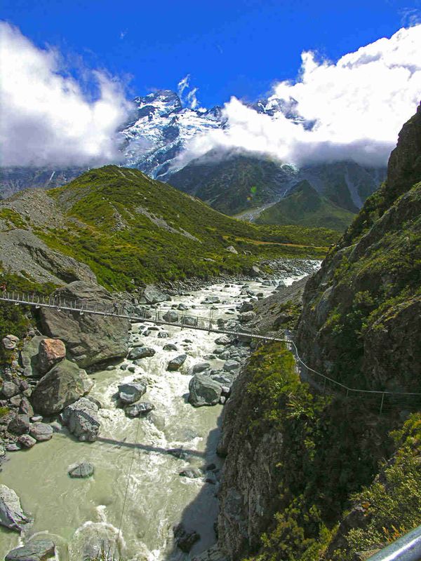 Trail & bridge across glacier stream in Mt. Cook Nat. Park, New Zealand