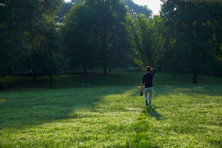 Steven Walking Thru Grassy Area Near Hurt St NE & Euclid Ave NE   Inman Park Neighborhood A130709 Root to Leaf Steven Satterfield Cookbook 2013