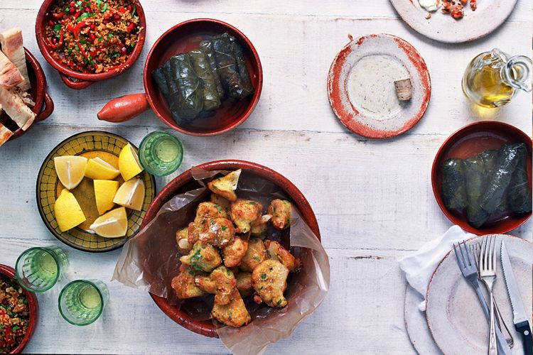 Feed Me Now Bill Granger © JOHN KERNICK NO RIGHTS GRANTED Cauliflower fritters; dolmades and bits (Friends/menu)