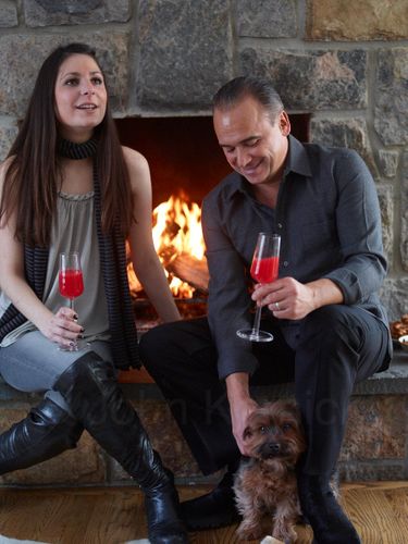 Jean Georges enjoying Cocktails: Brandied Cherry Manhattan & Blood Orange Bellini. Snacks: Marinated Olives, Rosemary Popcorn & Smoked Pecans. A110119. Homecooking w/Jean Georges Jean   © John Kernick NO RIGHTS GRANTED