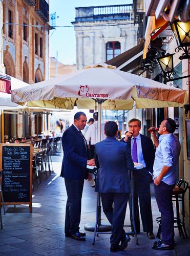 Men eating Tapa at Lunch near Sierpes MT 7320 Seville