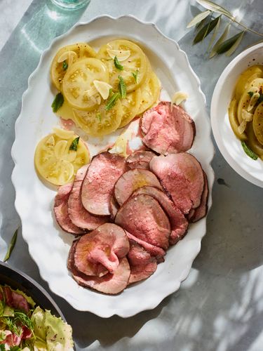 Roast Beef with Pickled Green Tomatoes, Shaved Garlic, Chiles and Mint   A170202   Food & Wine   Home Away From Home   Sicily   May 2017