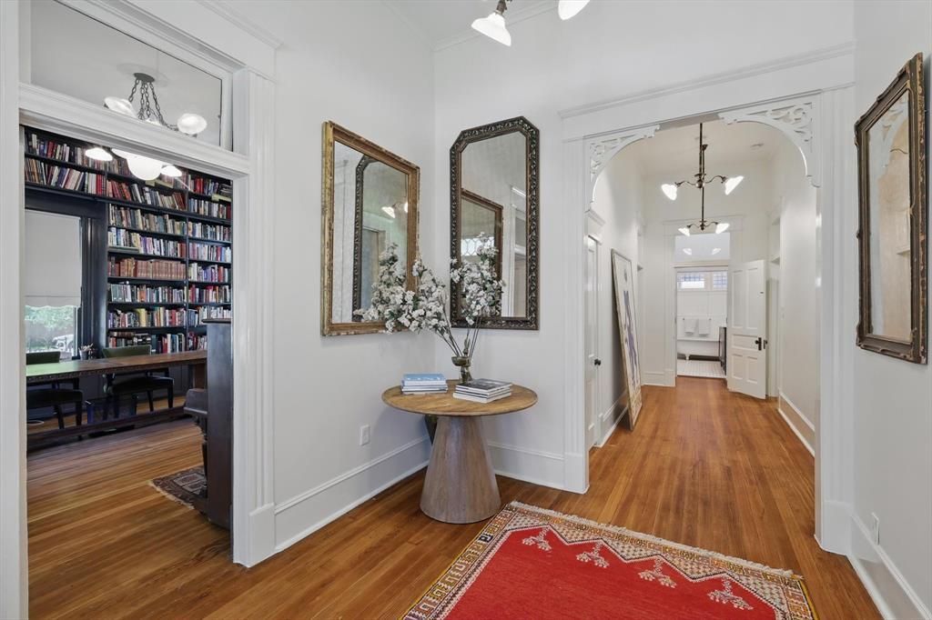 Benton-View from foyer into library and dogtrot.jpg