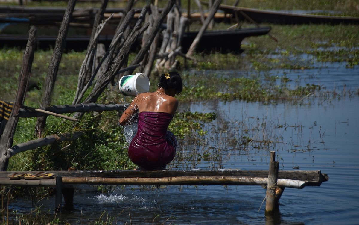 Woman bathing - Burma.jpg