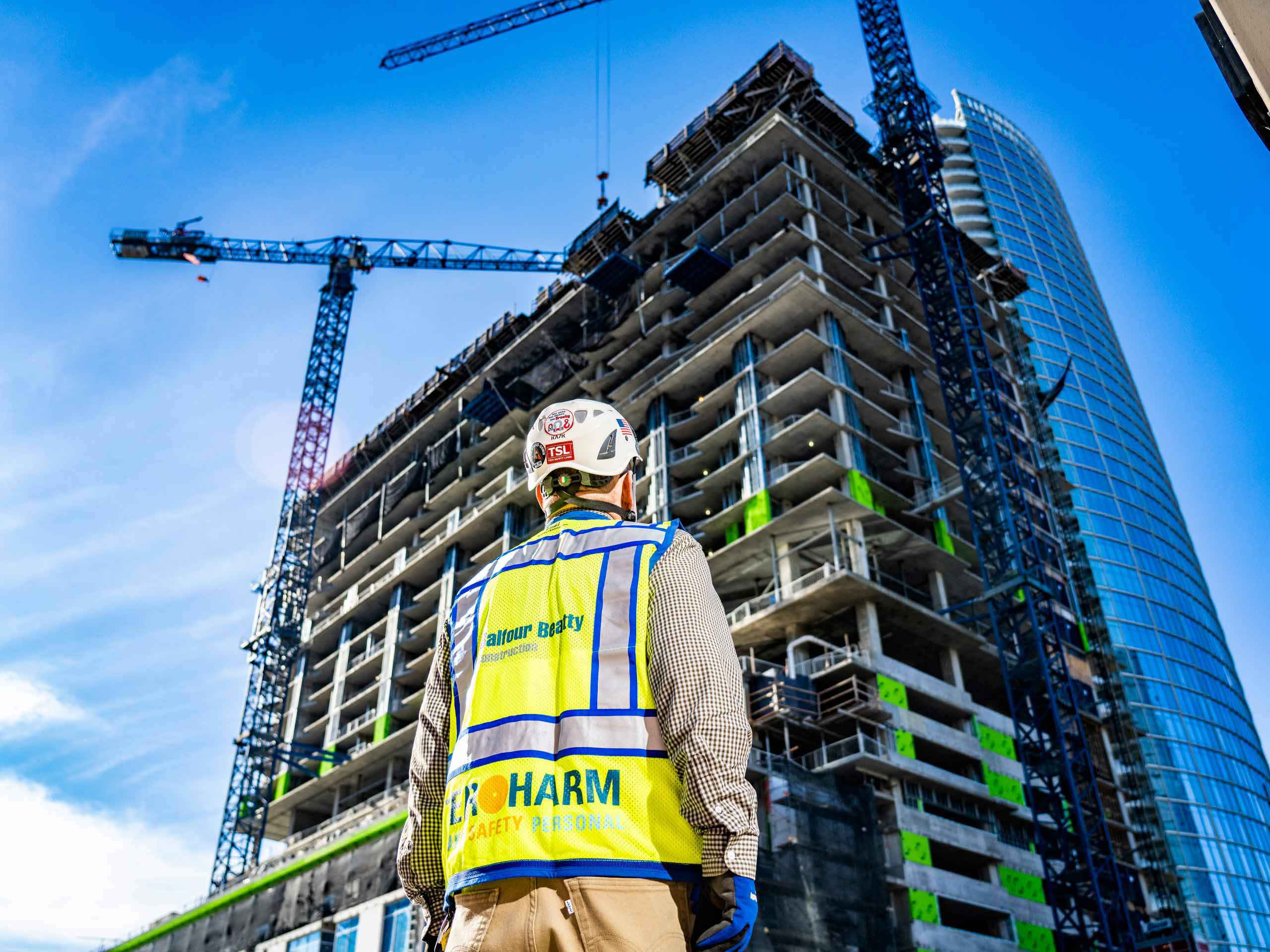 Industrial photography of high-rise construction and development in Dallas, emphasizing architectural scale and urban growth. Dallas High-Rise Construction Photography