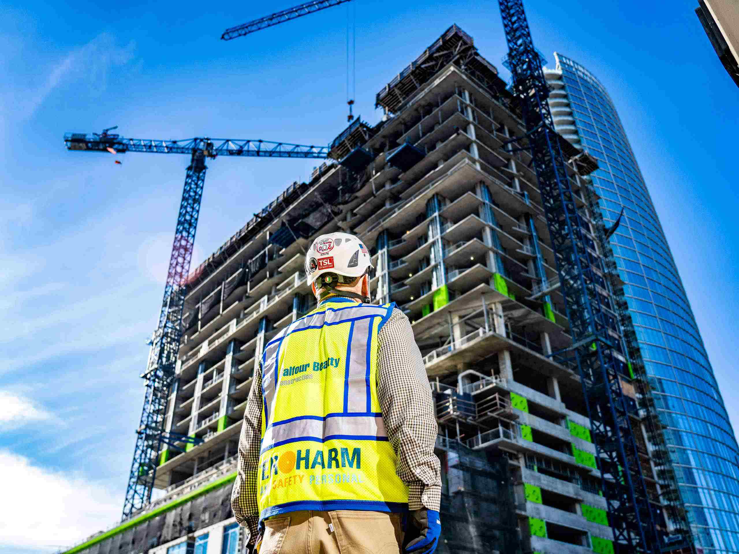 Industrial photography of high-rise construction and development in Dallas, emphasizing architectural scale and urban growth. Dallas High-Rise Construction Photography