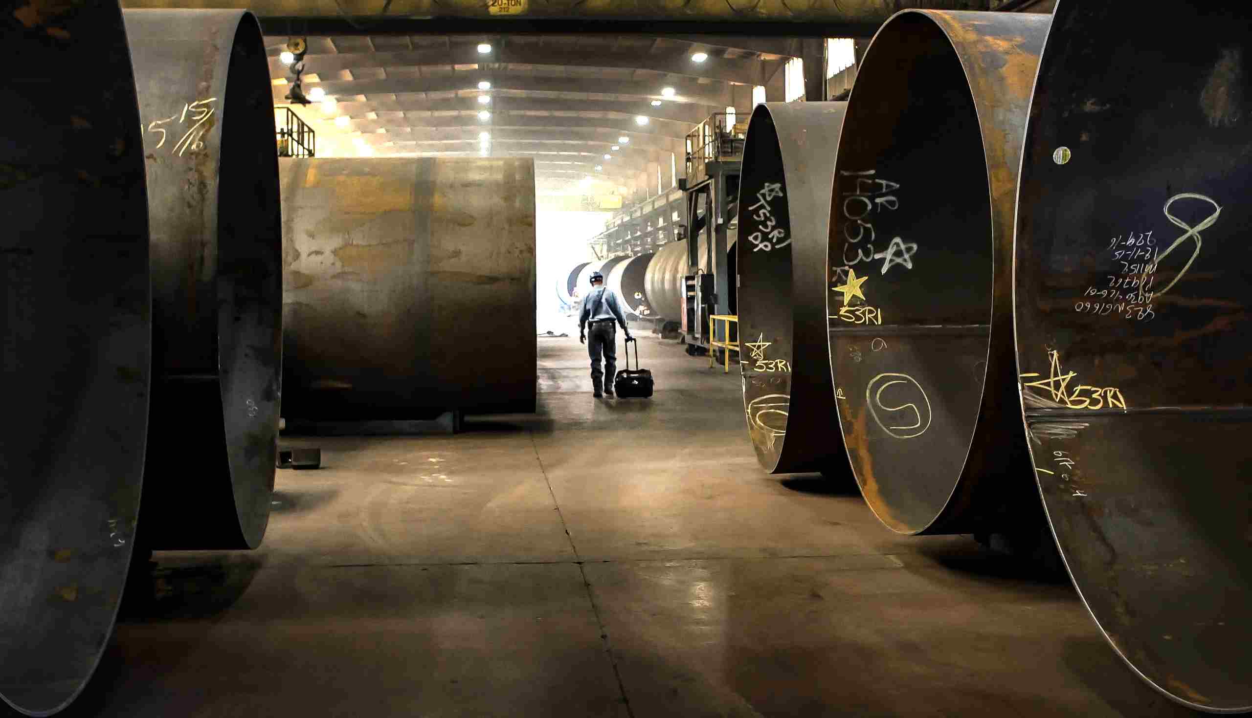 Detailed industrial photo showcasing the making of a tank car, emphasizing the precision and engineering involved. Tank Car Manufacturing Process