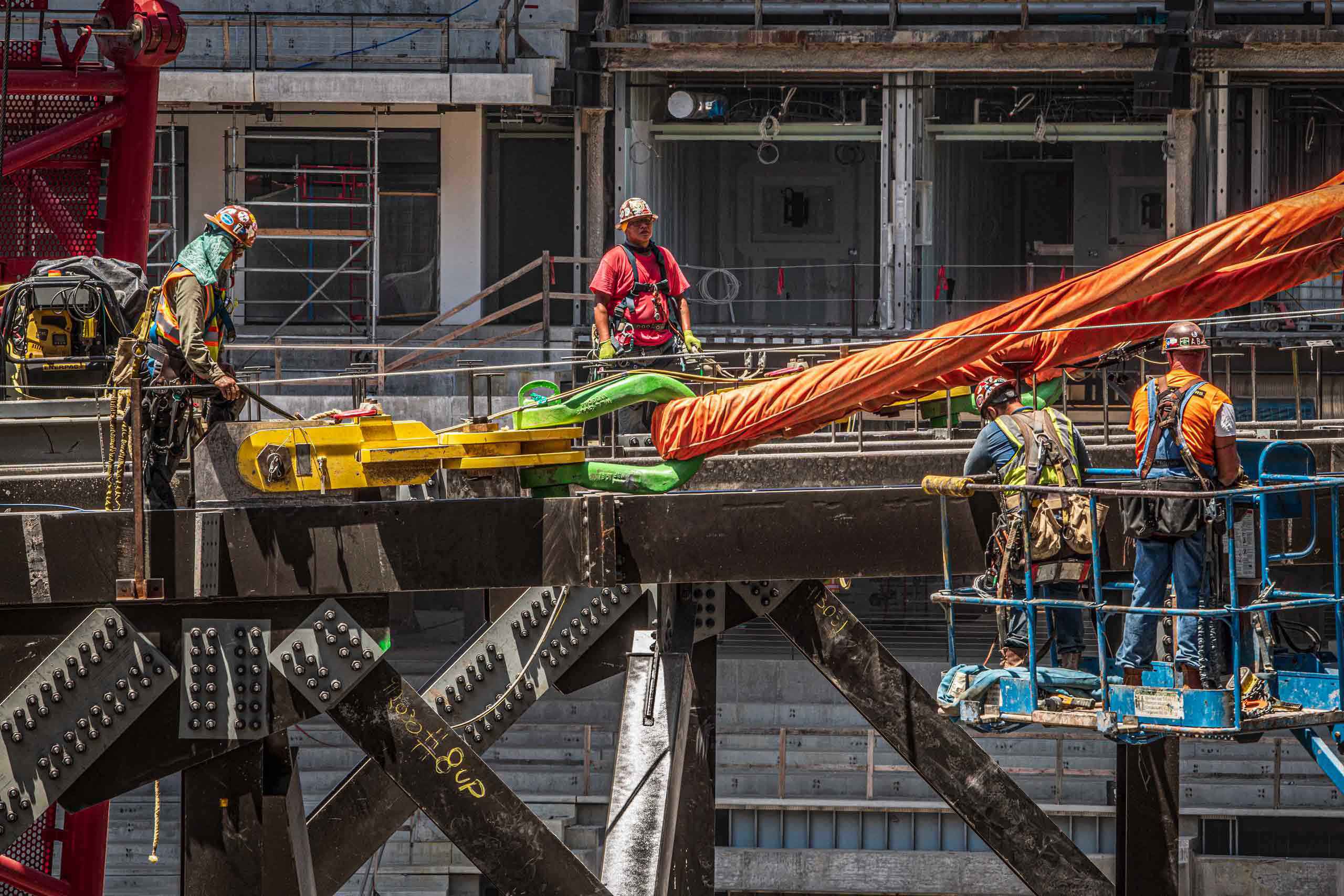 Industrial photo of steel workers building Globe Life Field, showcasing structural engineering and construction efforts. Steel Workers Constructing Globe Life Field