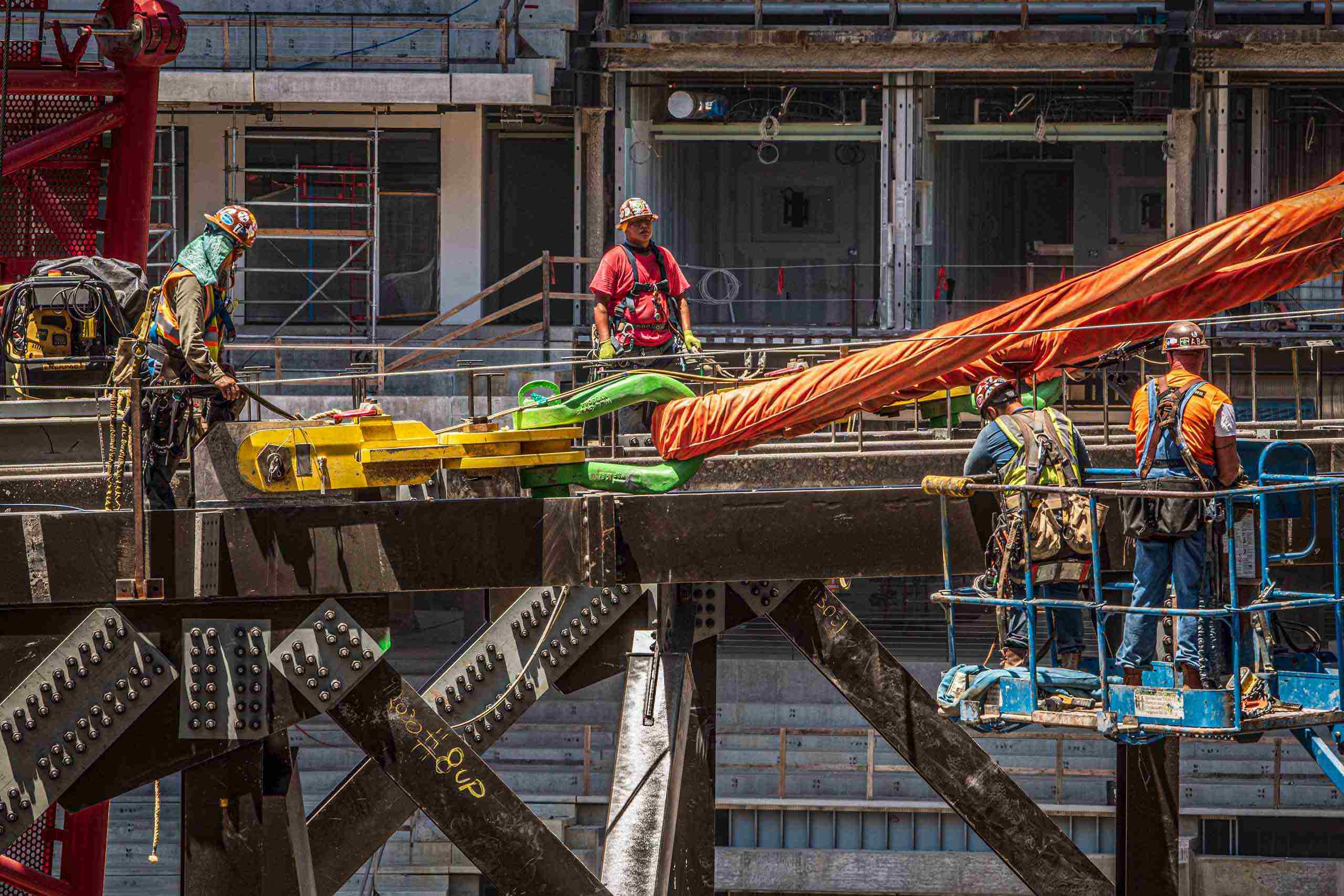 Industrial photo of steel workers building Globe Life Field, showcasing structural engineering and construction efforts. Steel Workers Constructing Globe Life Field