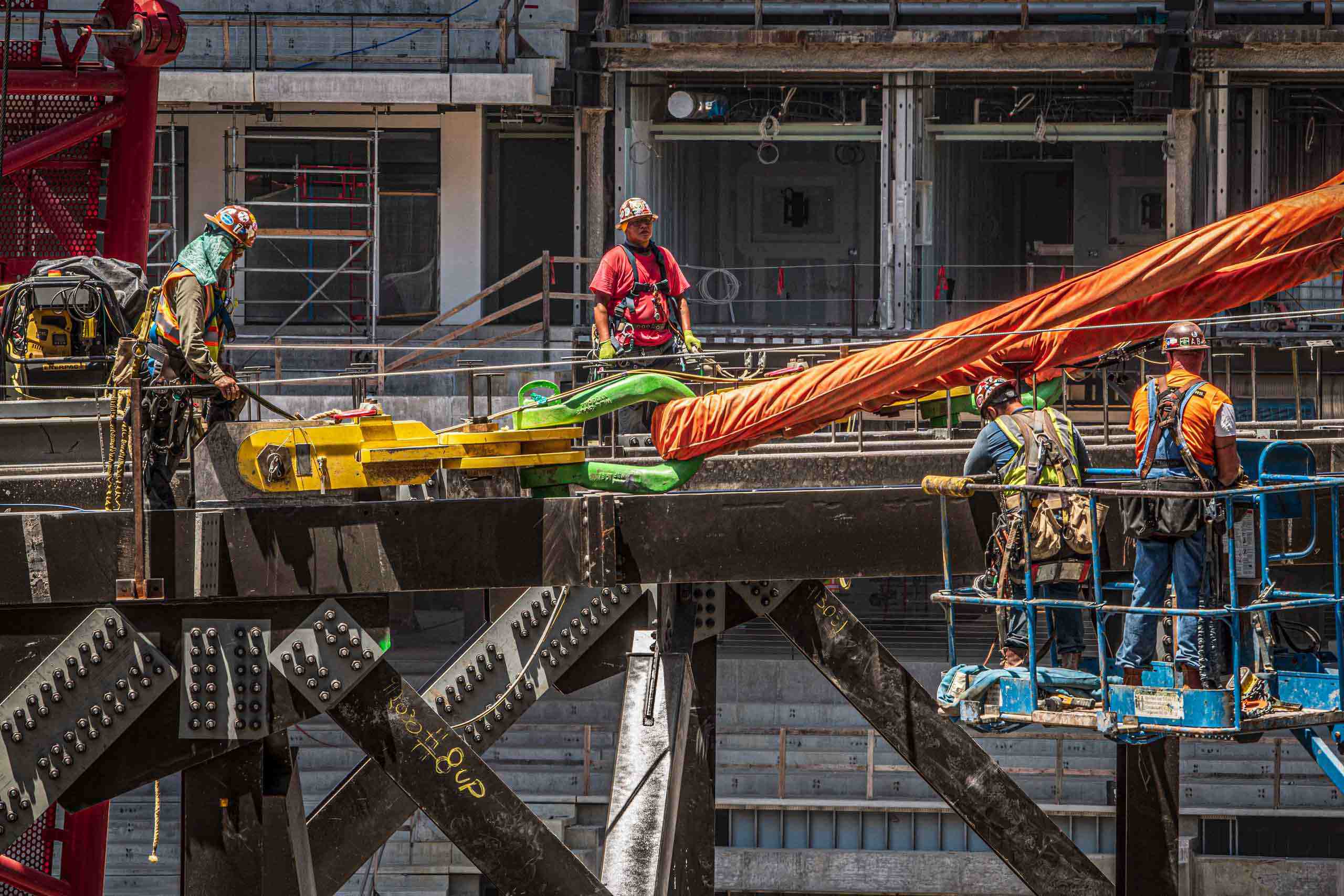 Crafting Excellence: Iron Workers Constructing Globe Life Field with Precision