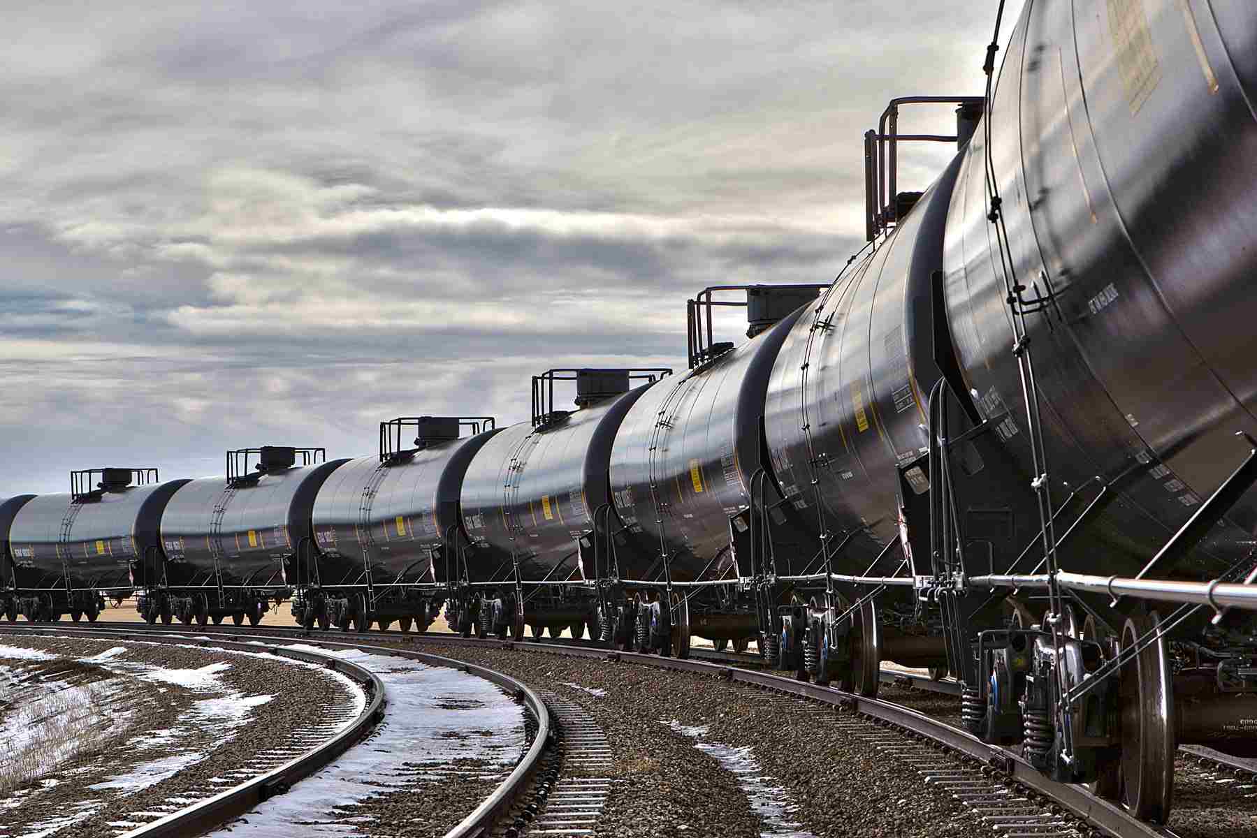 Industrial photo of tank cars being loaded at a facility in South Dakota, emphasizing logistics and operational efficiency. Tank Cars Loading at South Dakota Facility