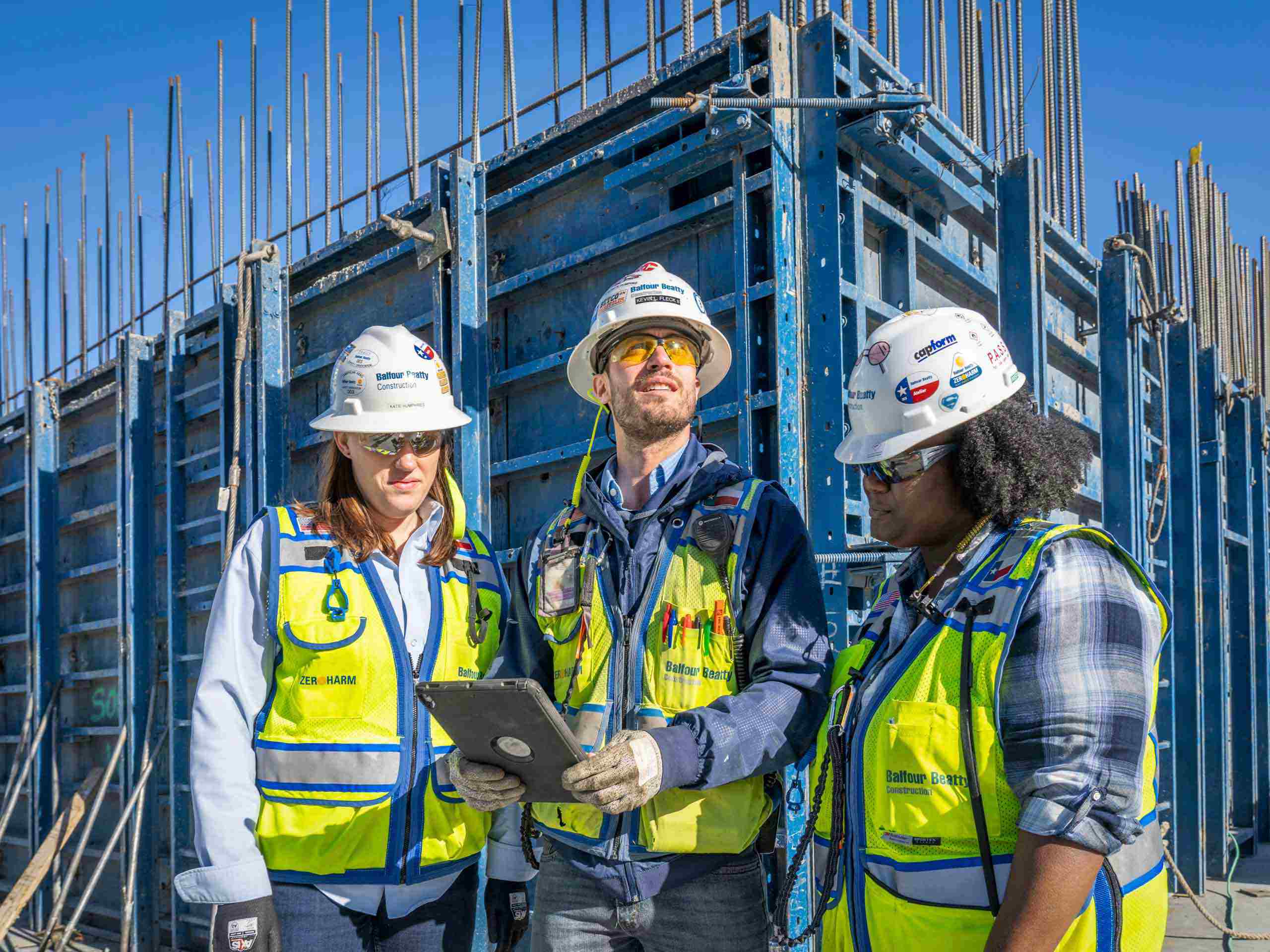 Industrial photo of Balfour Beatty construction employees on-site, highlighting teamwork and professionalism for corporate reporting. Balfour Beatty Construction Team - Annual Report Photo