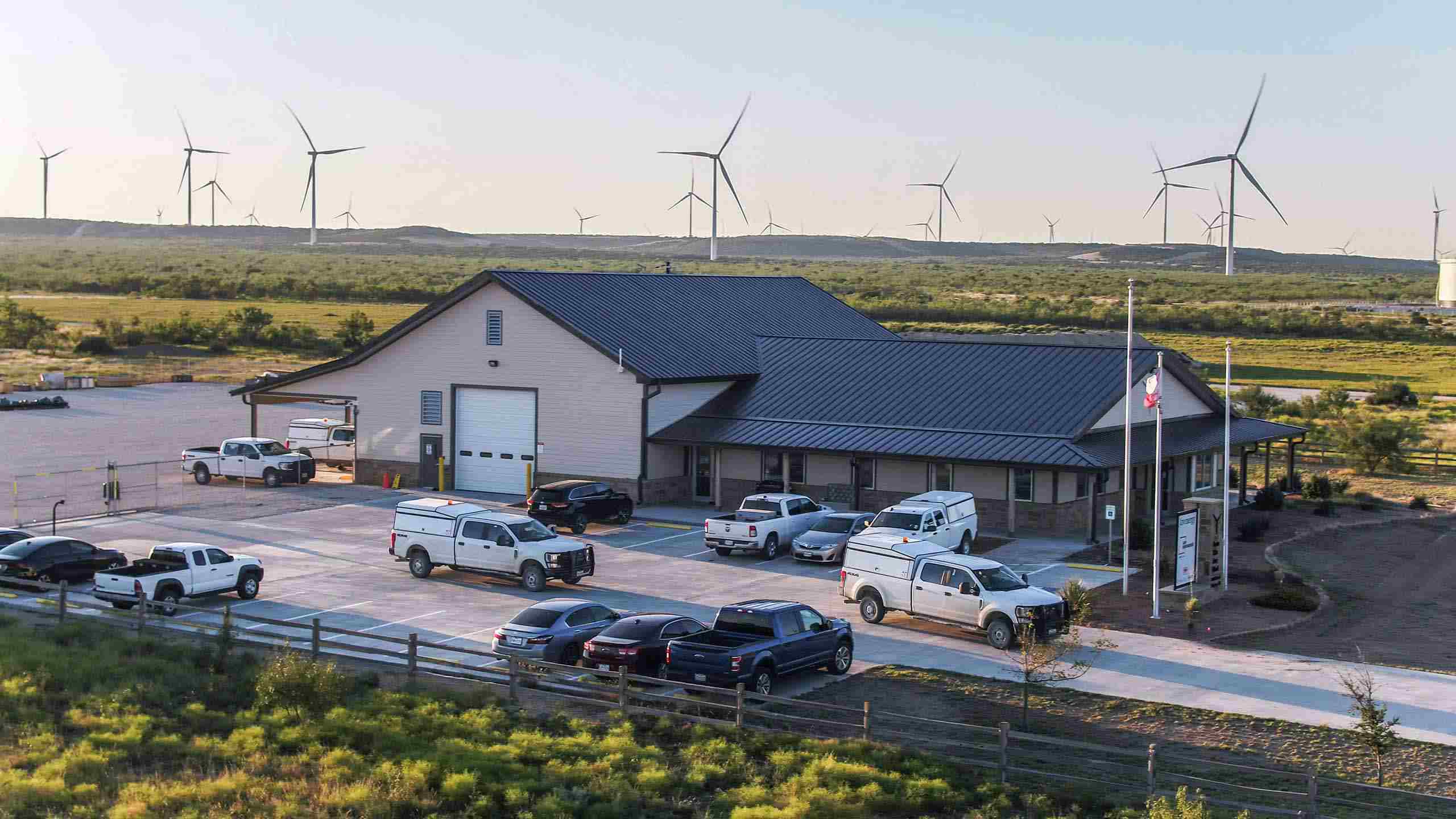 Aerial drone photo and video of wind farms, highlighting renewable energy infrastructure and operational landscapes. Drone Aerial Photography of Wind Farms - Industrial Videography