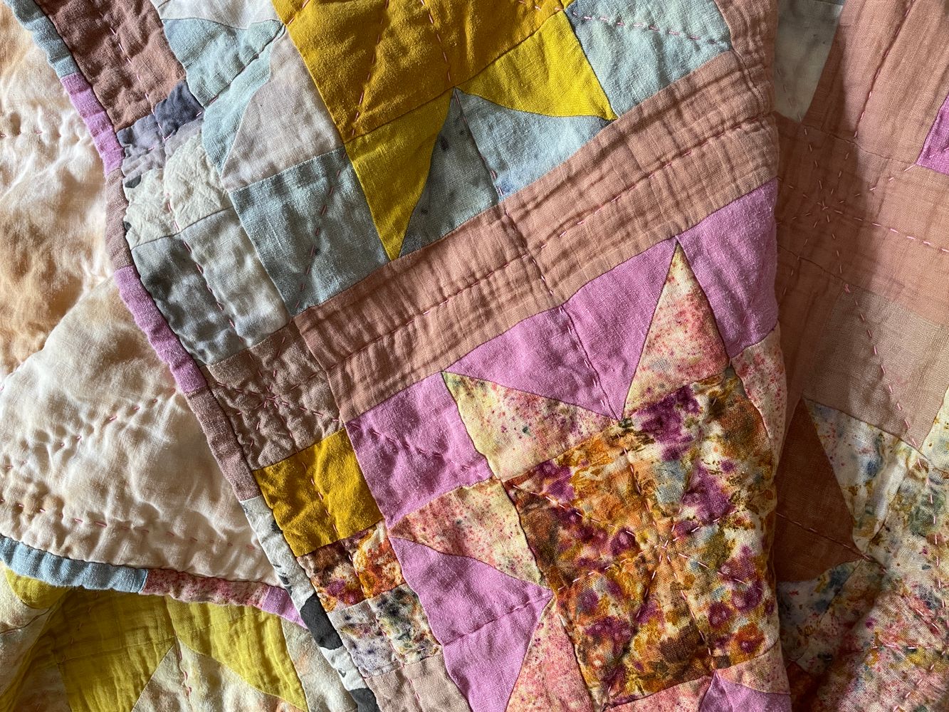 Sawtooth star quilt w/ natural dyes