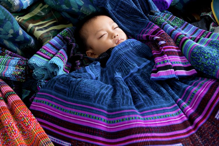 vietnam_sapa_baby_sleeping_tribal_textiles_market.jpg
