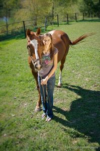 Carmody daughter w horse.jpg