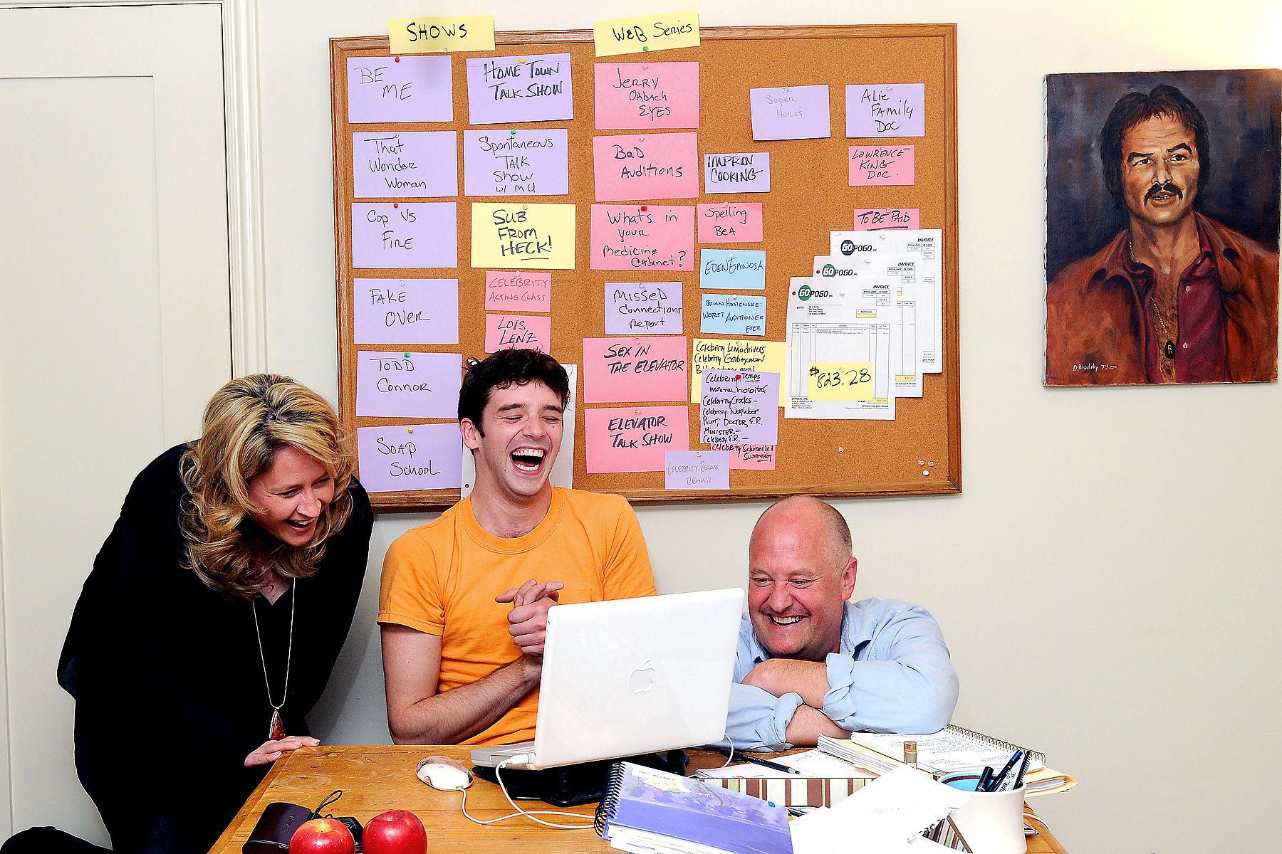 Michael Urie and his production company associates look over TV pilot ideas during "A day in the life of Michael Urie" shot for TV Guide  Magazine