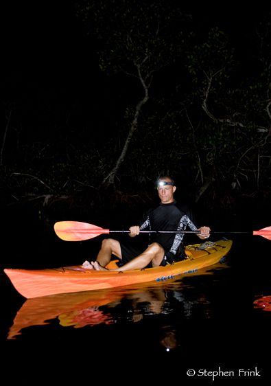 Kayaker at night, Key Largo, Florida.