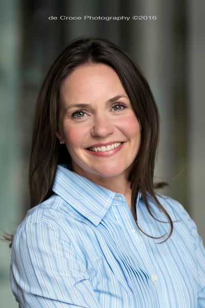 The vertical headshot portrait was made by the commercial business photographers on location in downtown Denver. Vertical Headshot Denver Photography