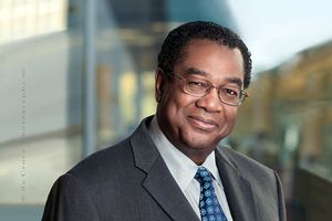 Denver photographer ––DeCoce, captured soulful artistic business portrait and Denver head-shots on location in Denver office for WPX Energy. African American Business Portrait