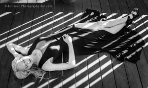 Denver beauty photographer creates dynamic composition in light and shadow featuring Nicole. Beauty In Light & Dark