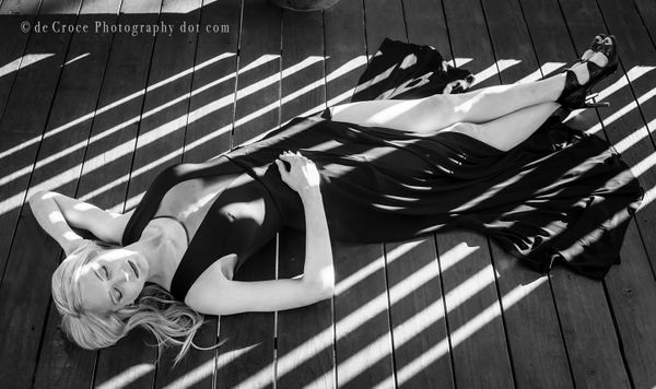 Denver beauty photographer creates dynamic composition in light and shadow featuring Nicole. Beauty In Light & Dark