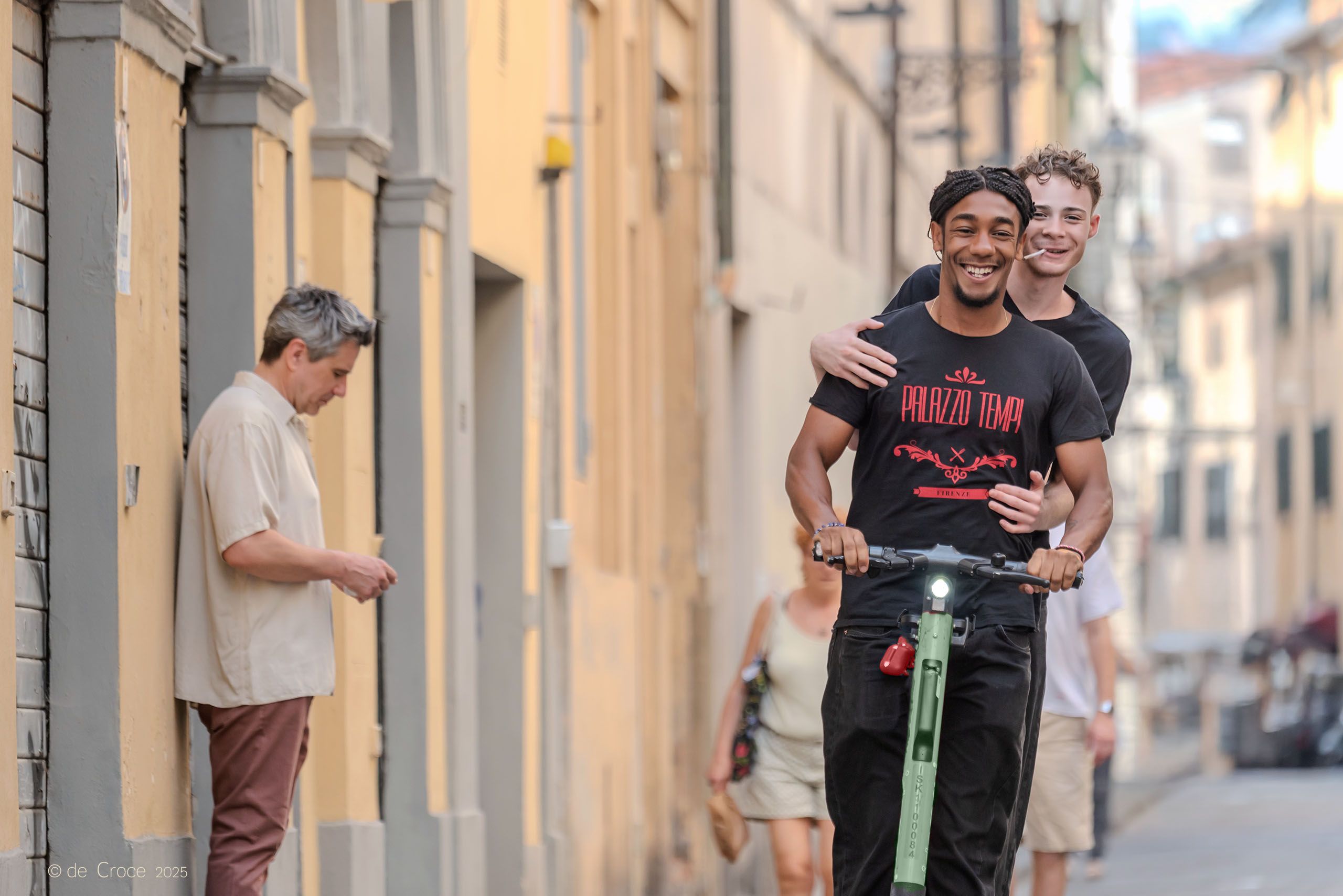 Travel Photographer Edward DeCroce, captures lifestyle moment in Florence Italy street photography. Street Photography-Scooter Florence Italy